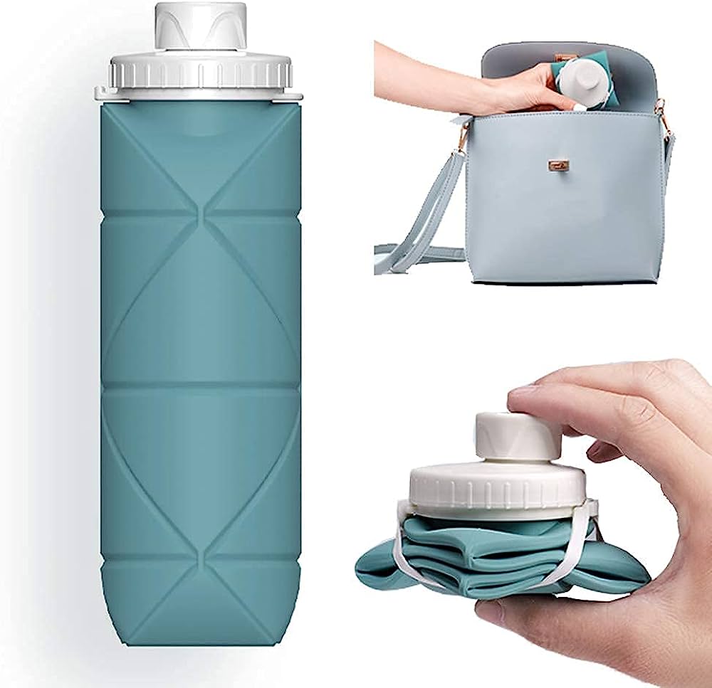 a hand holding a blue collapsible silicon water bottle